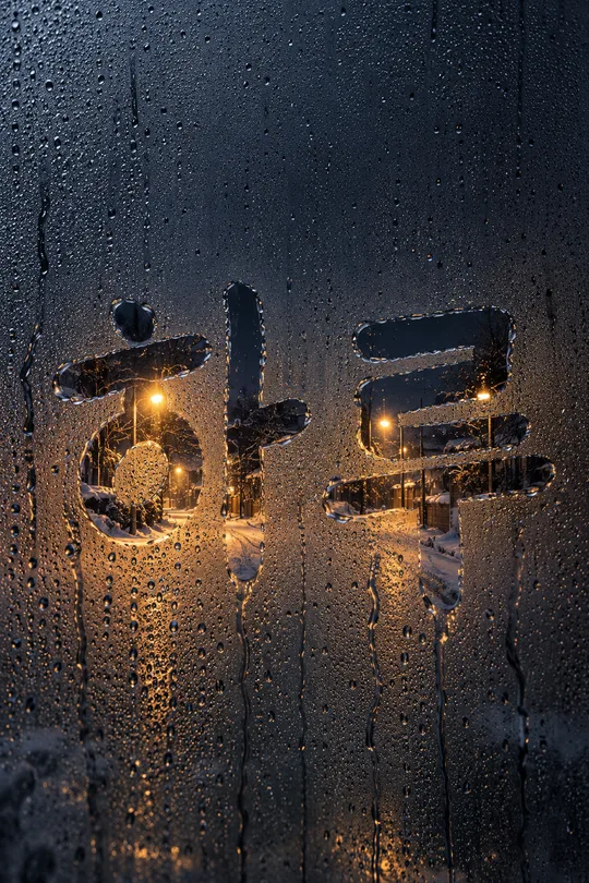 Finger-written fogged window wallpaper